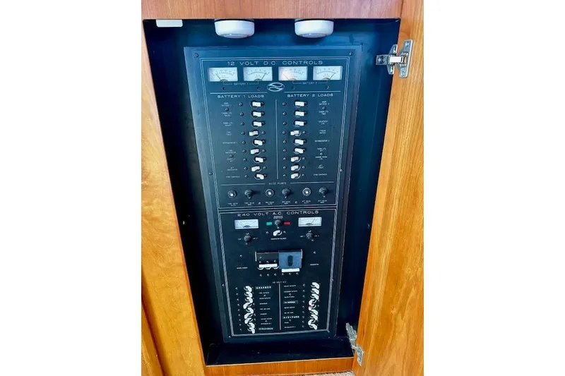 Slide: The Image of Electrical control panel on a 2001 Silverton 42 Convertible boat. - 19