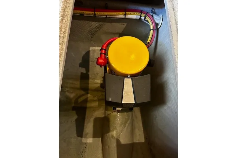 Slide: The Image of 2001 Silverton 42 Convertible engine compartment with yellow-capped component and wiring. - 36