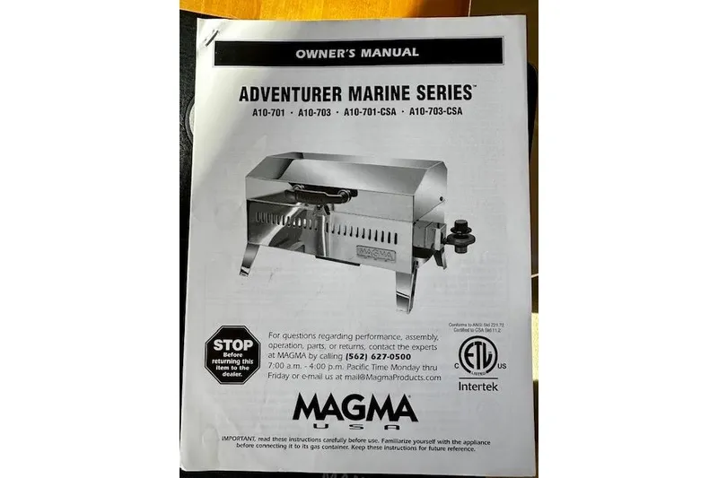 Slide: The Image of Owner's manual for Magma Adventurer Marine Series grill, featuring model details and contact information. - 48