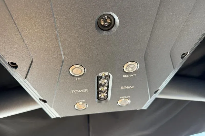 Slide: The Image of Control panel of 2025 Supra SE 575 boat with tower and bimini functions. - 5