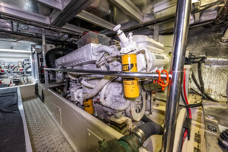 Slide: The Image of Engine room of 2001 Navigator Pilothouse yacht with CAT Marine Power engine. - 50