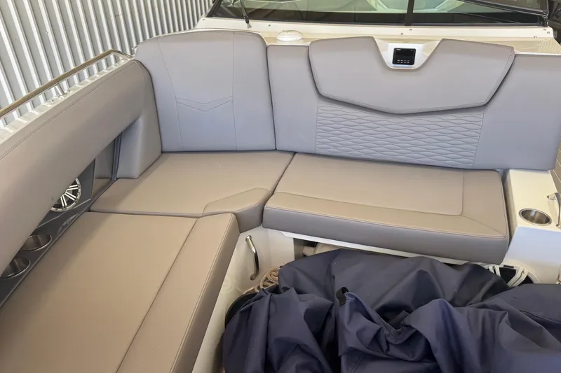Slide: The Image of 2021 Cruisers Yachts 338 South Beach Edition Bow Rider interior seating area. - 11
