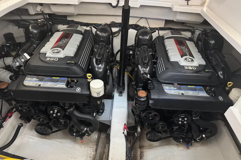 Slide: The Image of Twin engines in a 2021 Cruisers Yachts 338 South Beach Edition Bow Rider. - 26