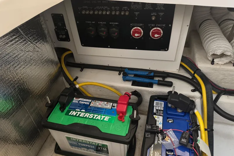 Slide: The Image of Battery compartment of 2021 Cruisers Yachts 338 South Beach Edition Bow Rider. - 28