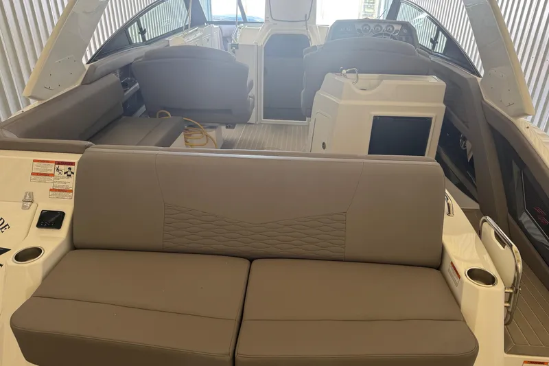 Slide: The Image of 2021 Cruisers Yachts 338 South Beach Edition Bow Rider interior with seating and helm. - 6