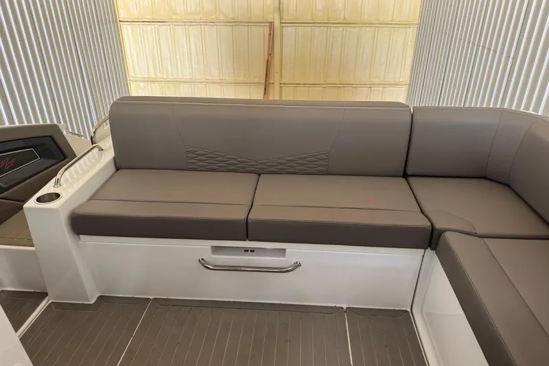 Slide: The Image of 2021 Cruisers Yachts 338 South Beach Edition Bow Rider interior seating area. - 8