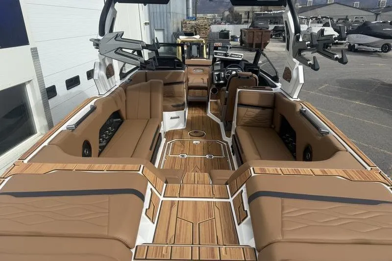 Slide: The Image of 2025 Supra SE 575 boat interior with luxurious seating and modern design. - 9