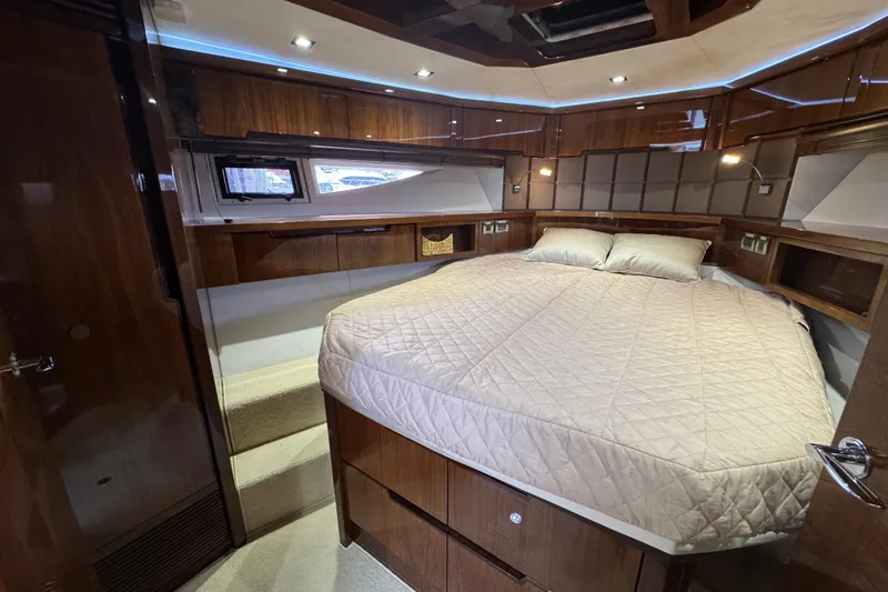 Slide: The Image of Luxurious cabin interior of 2017 Galeon 445 HTS yacht with cozy bed and wood finish. - 24
