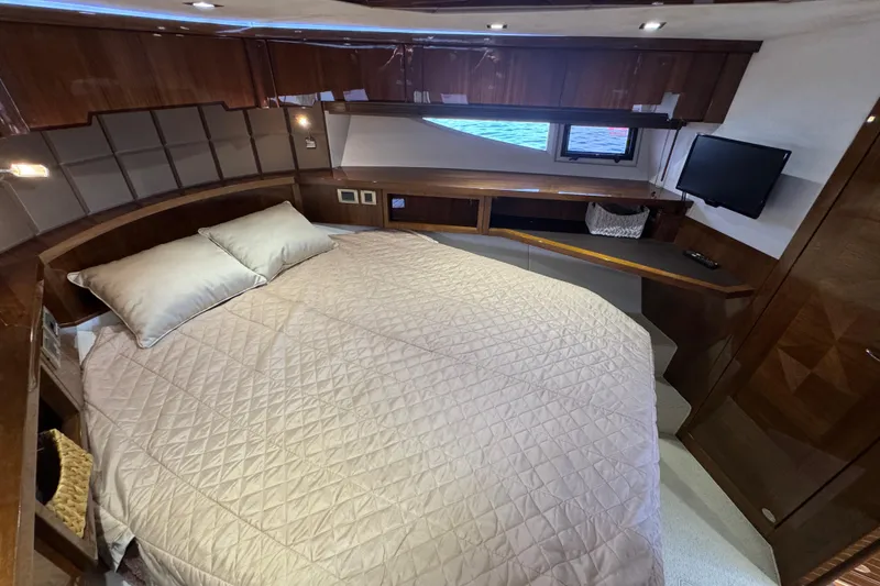 Slide: The Image of Luxurious cabin interior of 2017 Galeon 445 HTS yacht with cozy bed and modern amenities. - 25
