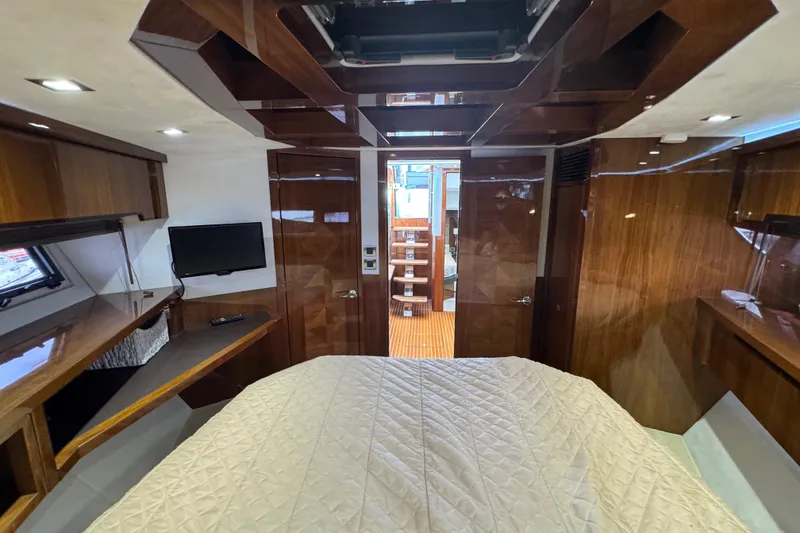 Slide: The Image of Luxurious interior of 2017 Galeon 445 HTS yacht with wood finishes and modern amenities. - 26