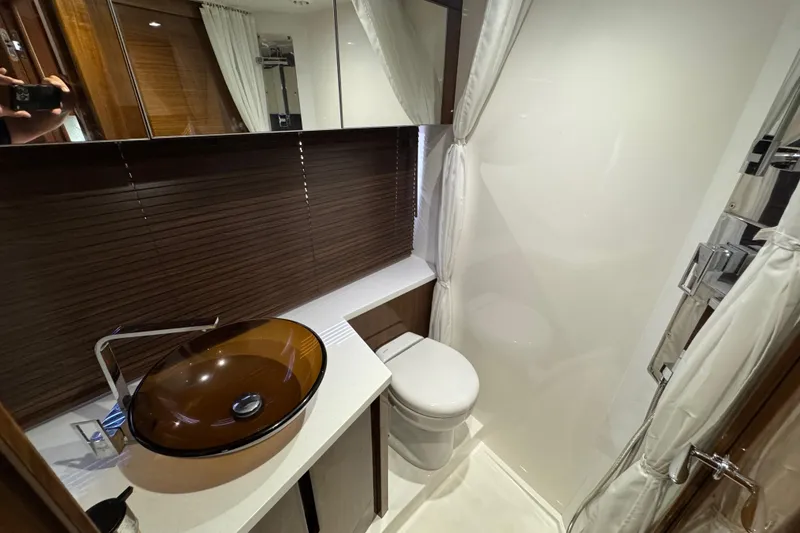 Slide: The Image of Luxurious bathroom in 2017 Galeon 445 HTS yacht with modern sink and toilet. - 27