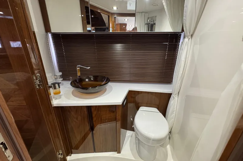 Slide: The Image of Luxurious bathroom in 2017 Galeon 445 HTS yacht with modern fixtures and elegant design. - 28