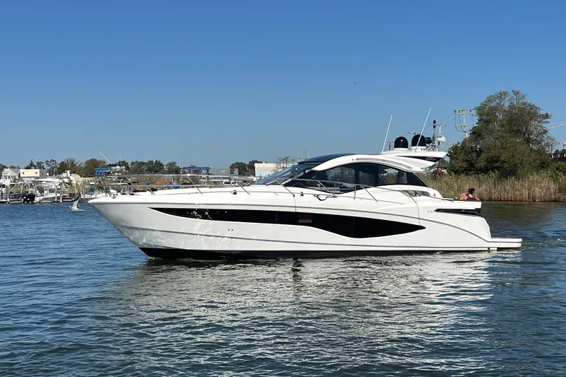 Slide: The Image of 2017 Galeon 445 HTS yacht cruising on a sunny day, side view. - 3
