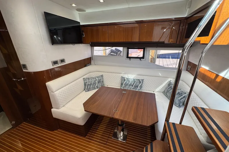 Slide: The Image of Luxurious interior of 2017 Galeon 445 HTS yacht with elegant seating and wooden accents. - 35