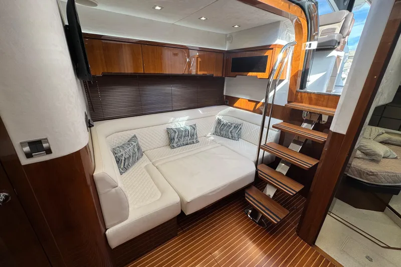 Slide: The Image of Luxurious interior of 2017 Galeon 445 HTS yacht with elegant seating and wooden accents. - 37
