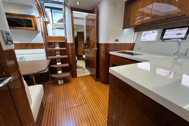 Slide: The Image of Luxurious interior of 2017 Galeon 445 HTS yacht with modern kitchen and wooden flooring. - 39