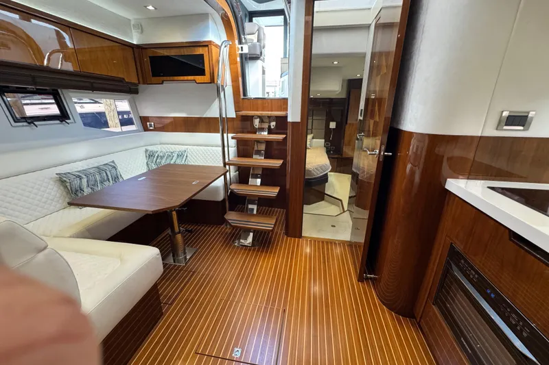 Slide: The Image of Luxurious interior of 2017 Galeon 445 HTS yacht with wood finishes and modern amenities. - 40