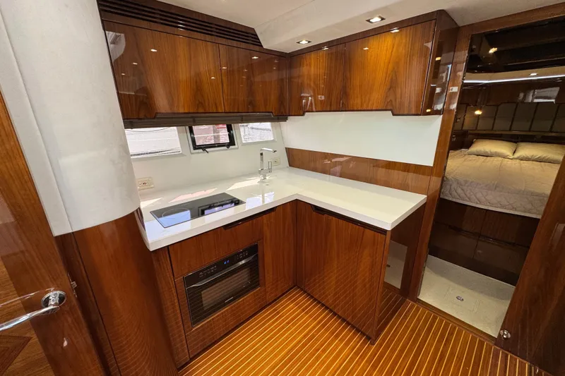 Slide: The Image of Luxurious 2017 Galeon 445 HTS yacht interior with modern kitchen and cozy bedroom. - 41