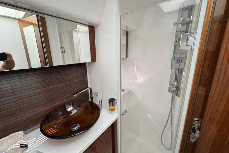 Slide: The Image of Luxurious bathroom in 2017 Galeon 445 HTS yacht with modern sink and shower. - 45