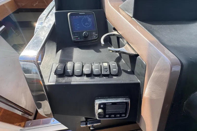 Slide: The Image of Control panel of a 2017 Galeon 445 HTS yacht with navigation instruments. - 58