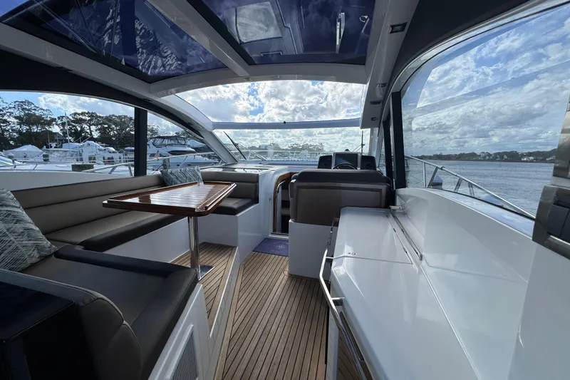 Slide: The Image of Luxurious interior of 2017 Galeon 445 HTS yacht with panoramic windows and elegant seating. - 73