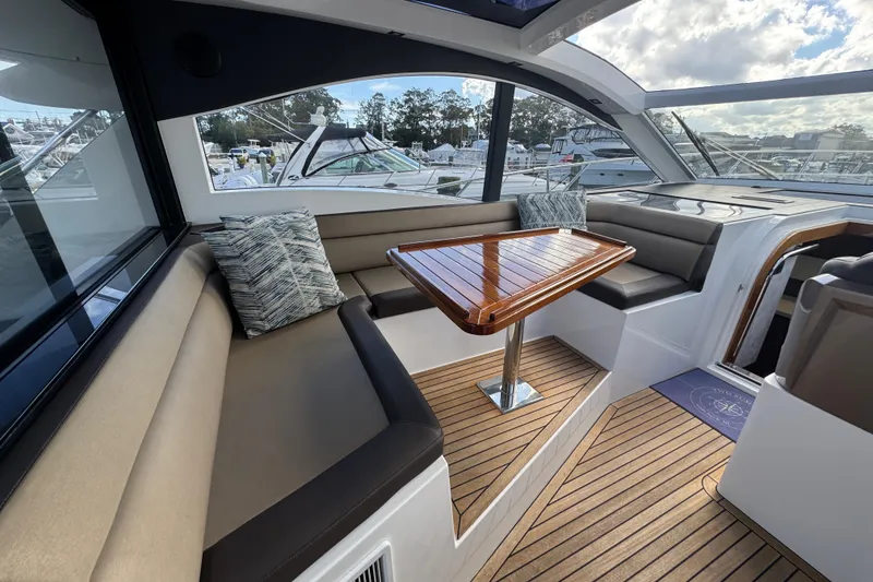 Slide: The Image of Luxurious interior of 2017 Galeon 445 HTS yacht with elegant seating and wooden table. - 74