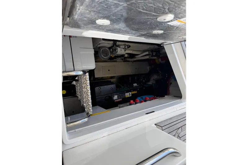 Slide: The Image of Engine compartment of 2017 Galeon 445 HTS yacht, showcasing mechanical components and wiring. - 75