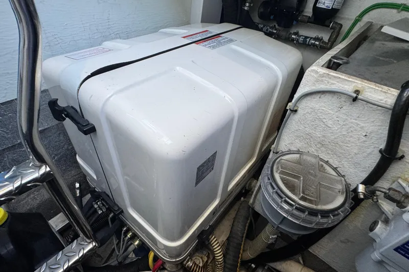 Slide: The Image of Engine compartment of a 2017 Galeon 445 HTS yacht, featuring mechanical components. - 81