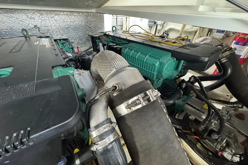 Slide: The Image of Engine compartment of a 2017 Galeon 445 HTS yacht, showcasing mechanical components. - 85