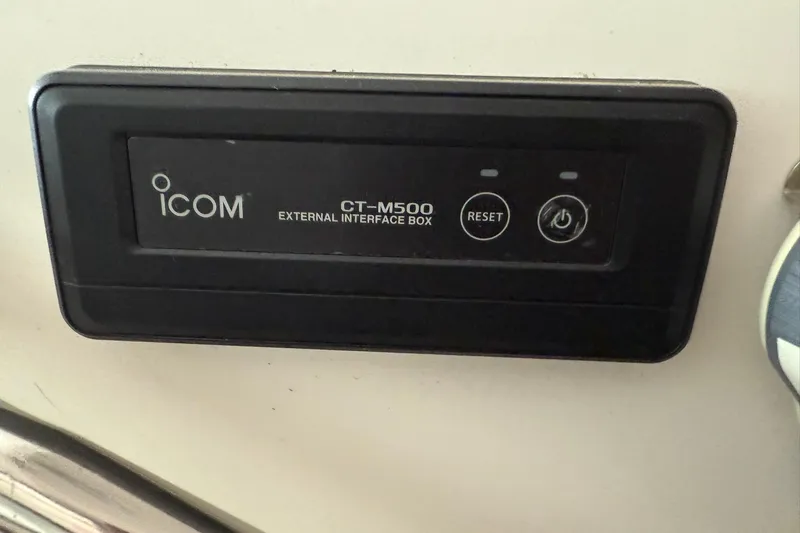 Slide: The Image of ICOM CT-M500 external interface box on 2000 Boston Whaler 28 Outrage boat. - 27