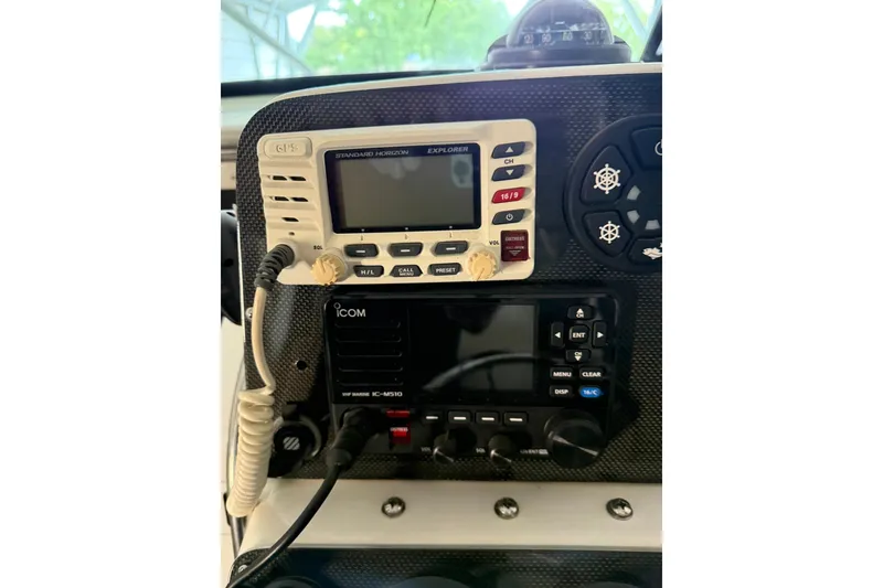 Slide: The Image of Control panel of a 2000 Boston Whaler 28 Outrage with GPS and radio equipment. - 28