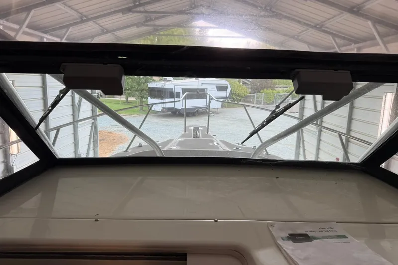 Slide: The Image of Interior view from a 2000 Boston Whaler 28 Outrage, parked in a covered area. - 39