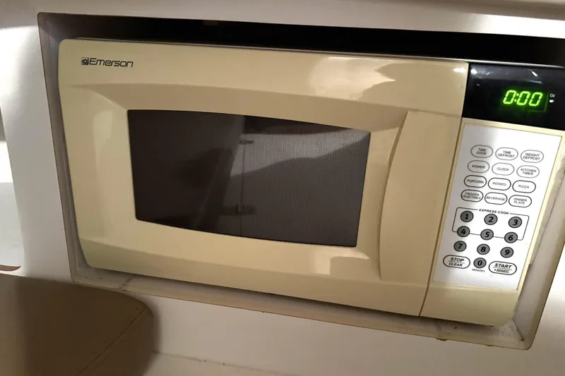 Slide: The Image of Emerson microwave installed in a 2000 Boston Whaler 28 Outrage boat. - 45
