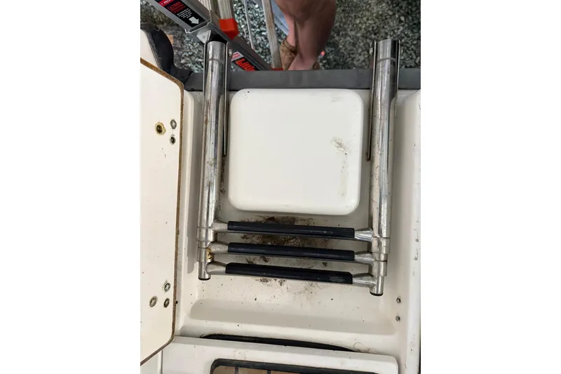 Slide: The Image of Boston Whaler 28 Outrage 2000 boat ladder and deck details. - 59