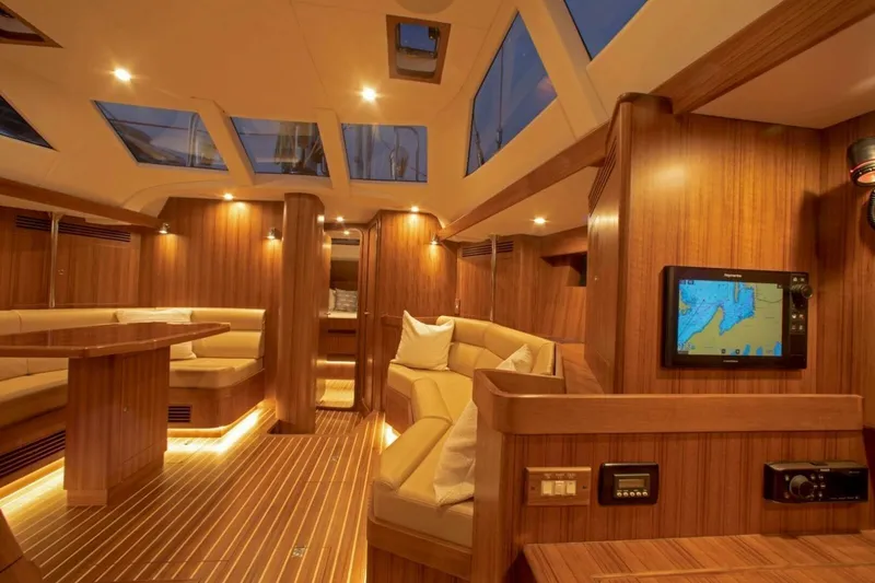 Slide: The Image of Luxurious interior of 2025 Hylas H48 yacht with wood finish and modern navigation system. - 14