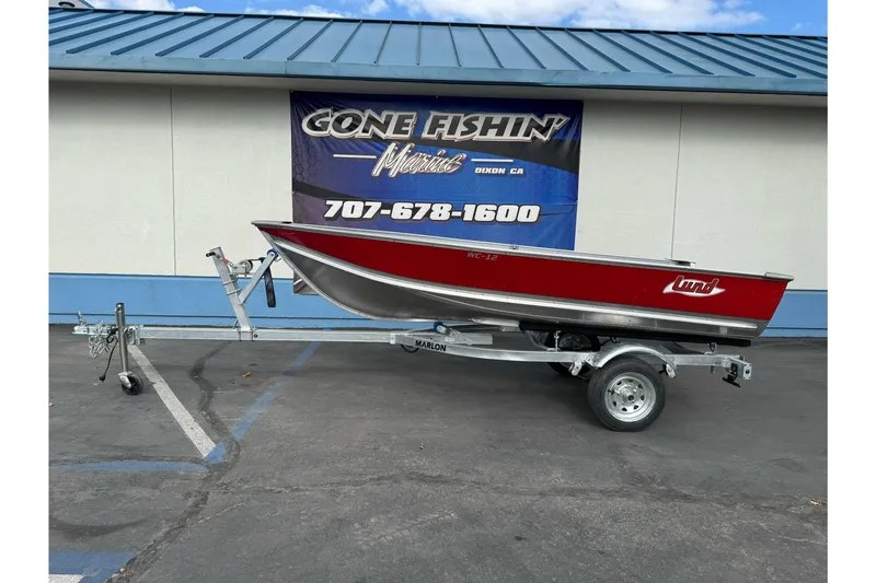 The Image of 2026 Lund WC 12 boat on trailer, displayed at Gone Fishin' Marine, Dixon, CA. - 0