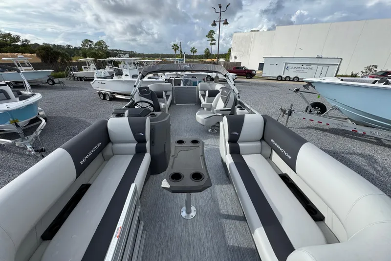 Slide: The Image of 2026 Bennington 22 SSR pontoon boat with spacious seating and modern design. - 16