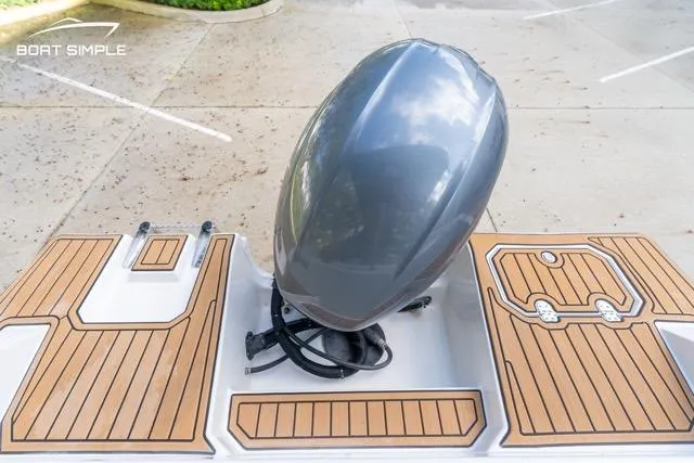 Slide: The Image of 2021 Starcraft SVX 191 OB boat with sleek outboard motor and stylish deck design. - 5