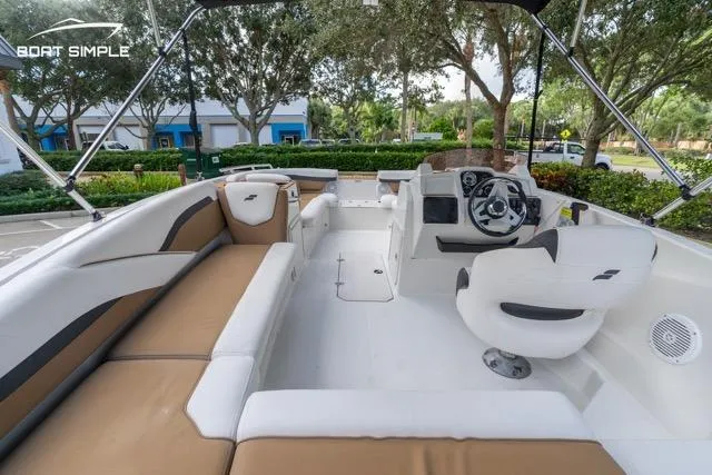 Slide: The Image of 2021 Starcraft SVX 191 OB boat interior with seating and steering console. - 14