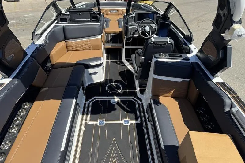 Slide: The Image of 2025 Supra SE 575 boat interior with luxurious seating and modern dashboard design. - 7