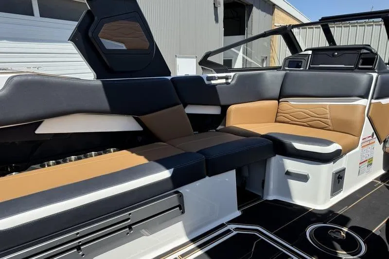 Slide: The Image of 2025 Supra SE 575 boat interior with luxurious seating and modern design. - 8