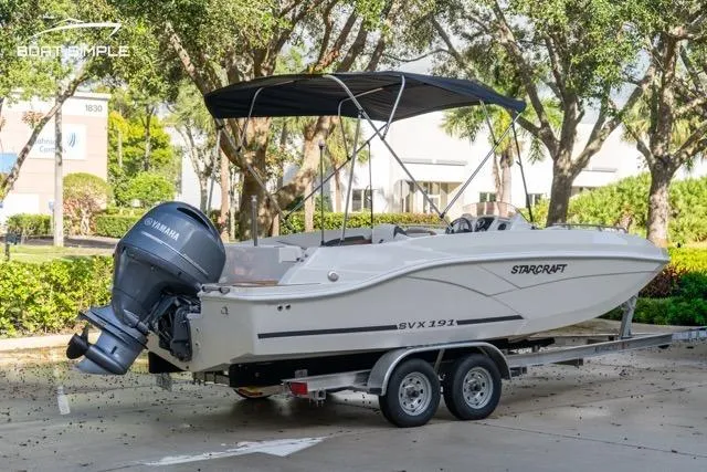 Slide: The Image of 2021 Starcraft SVX 191 OB boat on trailer with Yamaha outboard motor. - 4