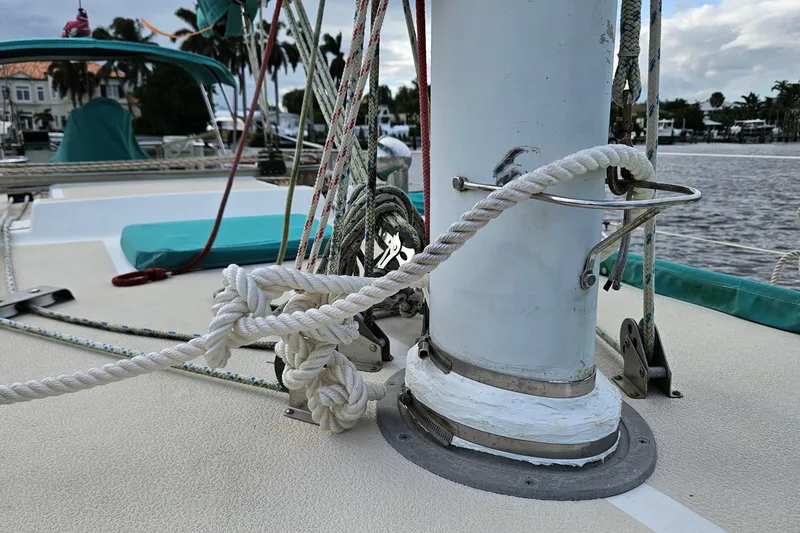 Slide: The Image of Close-up of 1987 Tartan 37 sailboat mast with ropes and fittings. - 17