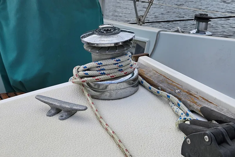Slide: The Image of Winch and cleat on 1987 Tartan 37 sailboat deck with rope. - 21