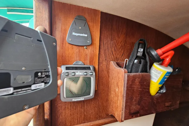 Slide: The Image of Interior of 1987 Tartan 37 sailboat with Raymarine navigation equipment. - 38