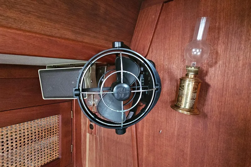 Slide: The Image of Interior of 1987 Tartan 37 yacht with fan, speaker, and vintage lamp. - 47