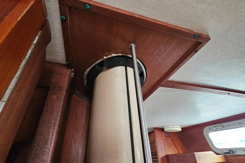 Slide: The Image of Interior view of 1987 Tartan 37 sailboat mast support with wooden paneling. - 55