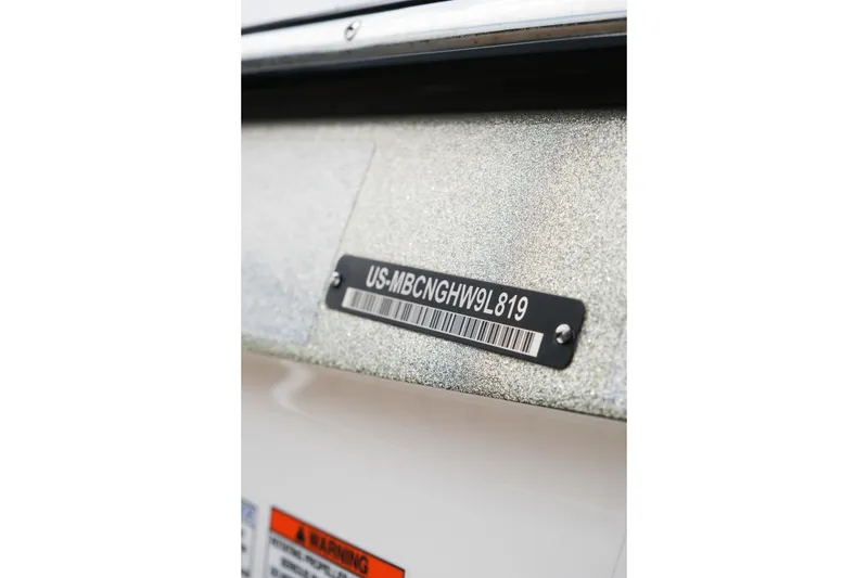 Slide: The Image of 2019 MasterCraft X22 boat identification plate with serial number and barcode. - 11