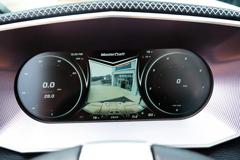 Slide: The Image of Dashboard of 2019 MasterCraft X22 boat with digital display and rearview camera. - 17