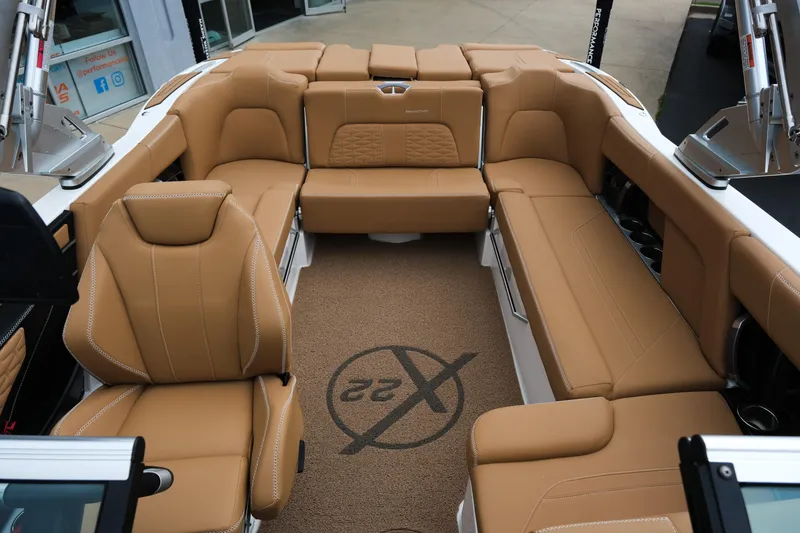Slide: The Image of Luxurious interior of 2019 MasterCraft X22 boat with tan leather seating. - 37